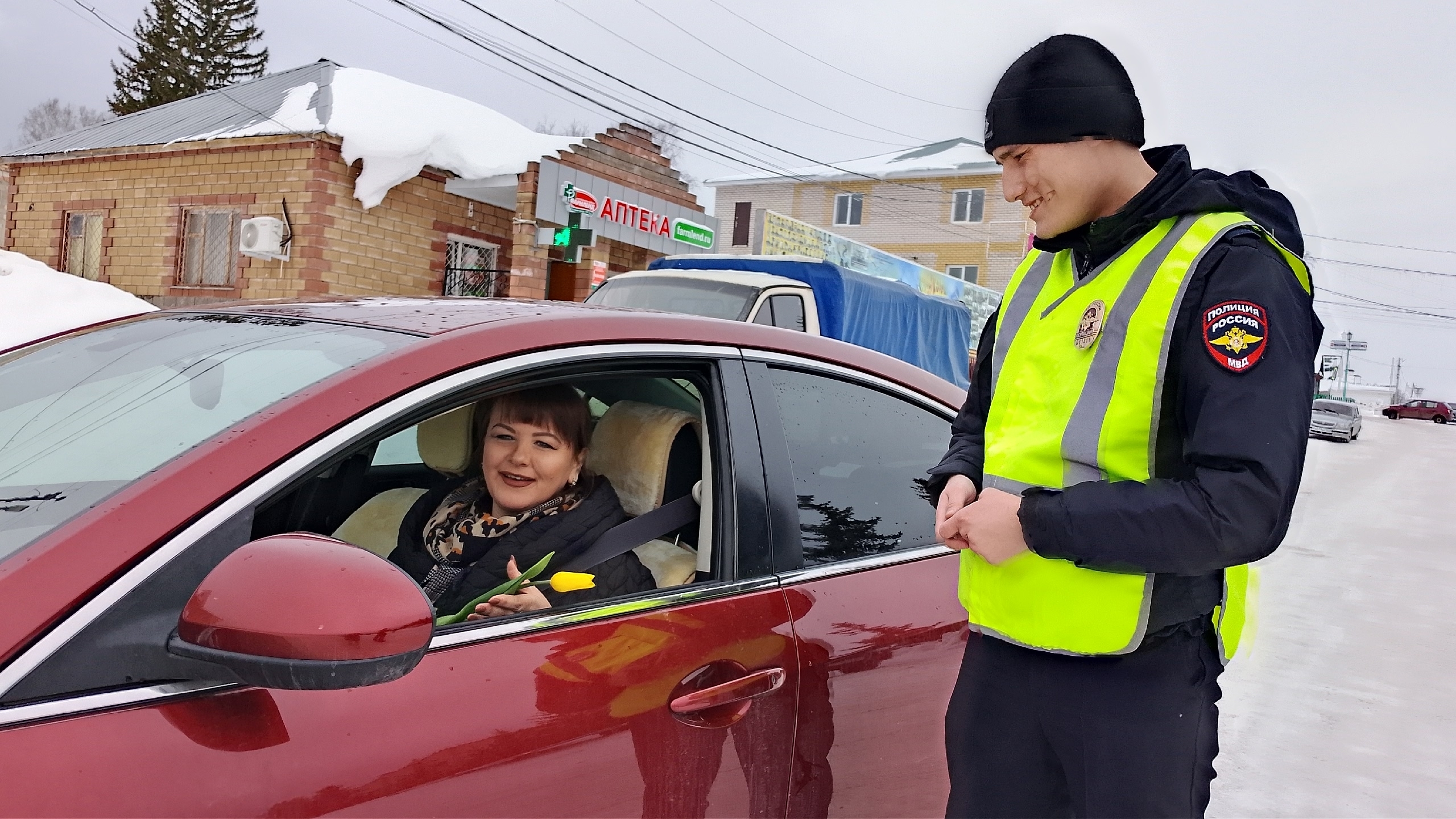 Водитель ҡатын-ҡыҙҙарға - сәскәләр